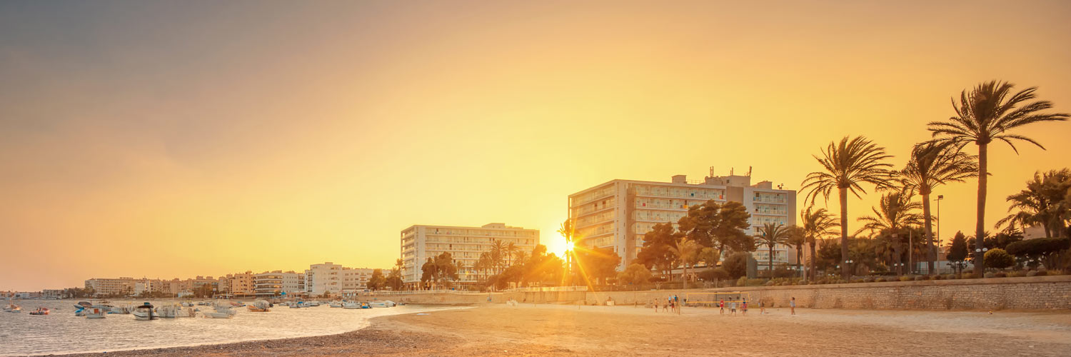 Ibiza beach hotel at sunset