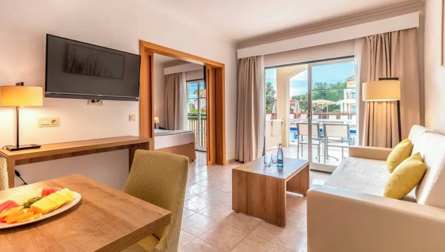 Hotel Zafiro Menorca One Bedroom Suite Living Room